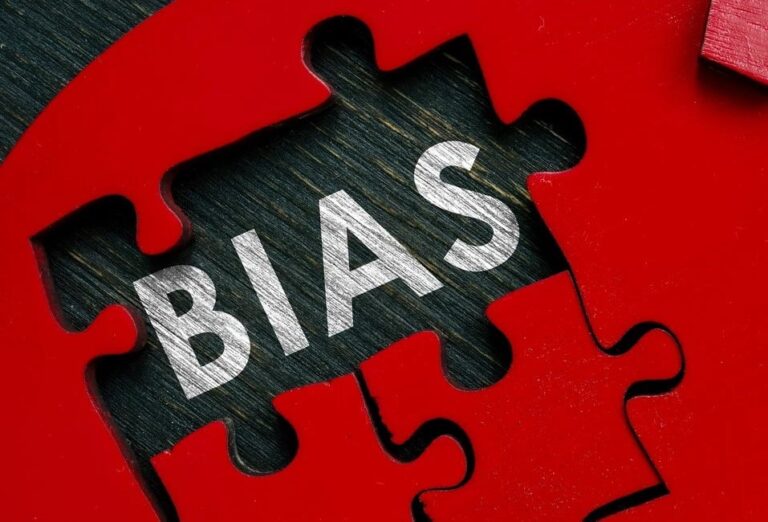 A jigsaw puzzle that spells out the word 'Bias'