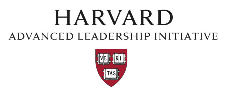 The logo for the Harvard Advanced Leadership Initiative, featuring the word "HARVARD" in a large black serif font at the top. Below it, the words "ADVANCED LEADERSHIP INITIATIVE" are written in a smaller black font. Centered at the bottom is the Harvard University shield, which is a dark red crest containing three open books with the letters "VE," "RI," and "TAS" across them.