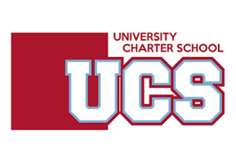 The logo for University Charter School, featuring a solid dark red rectangle on the left. Overlapping the rectangle and extending to the right are the large block letters "UCS" in light blue with a dark red outline. To the right of the red rectangle, the words "UNIVERSITY CHARTER SCHOOL" are stacked vertically in a dark red font.